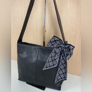 HOBO International genuine leather shoulder bag in classic black.